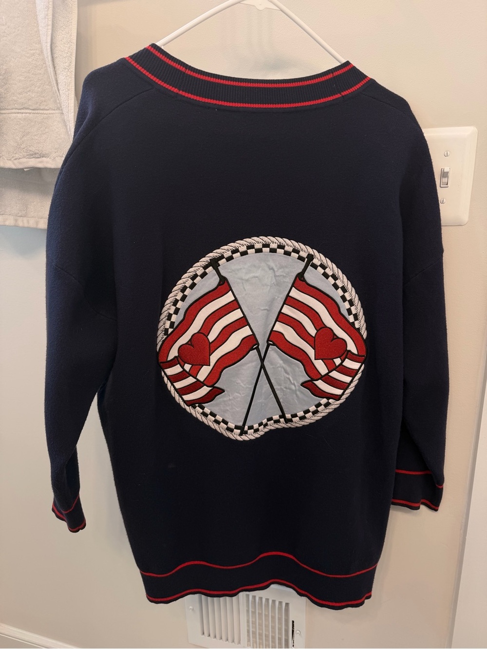 Sandro Navy Sweater with Red Trim and Flag Patch